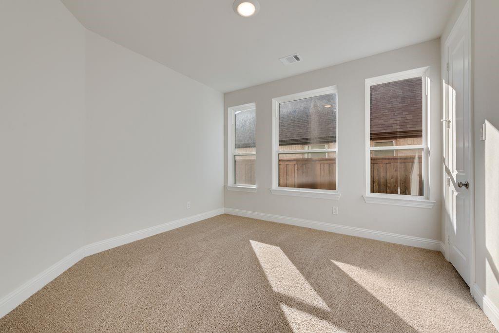 2438 Meridian Place Midlothian, TX 76065 - Photo 22 of 37 a view of an empty room with a window