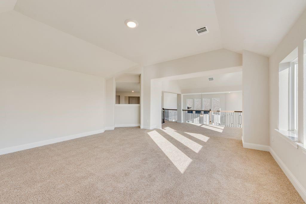 2438 Meridian Place Midlothian, TX 76065 - Photo 28 of 37 a view of empty room with a fireplace