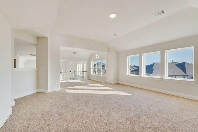 a view of livingroom with hardwood floor and a window