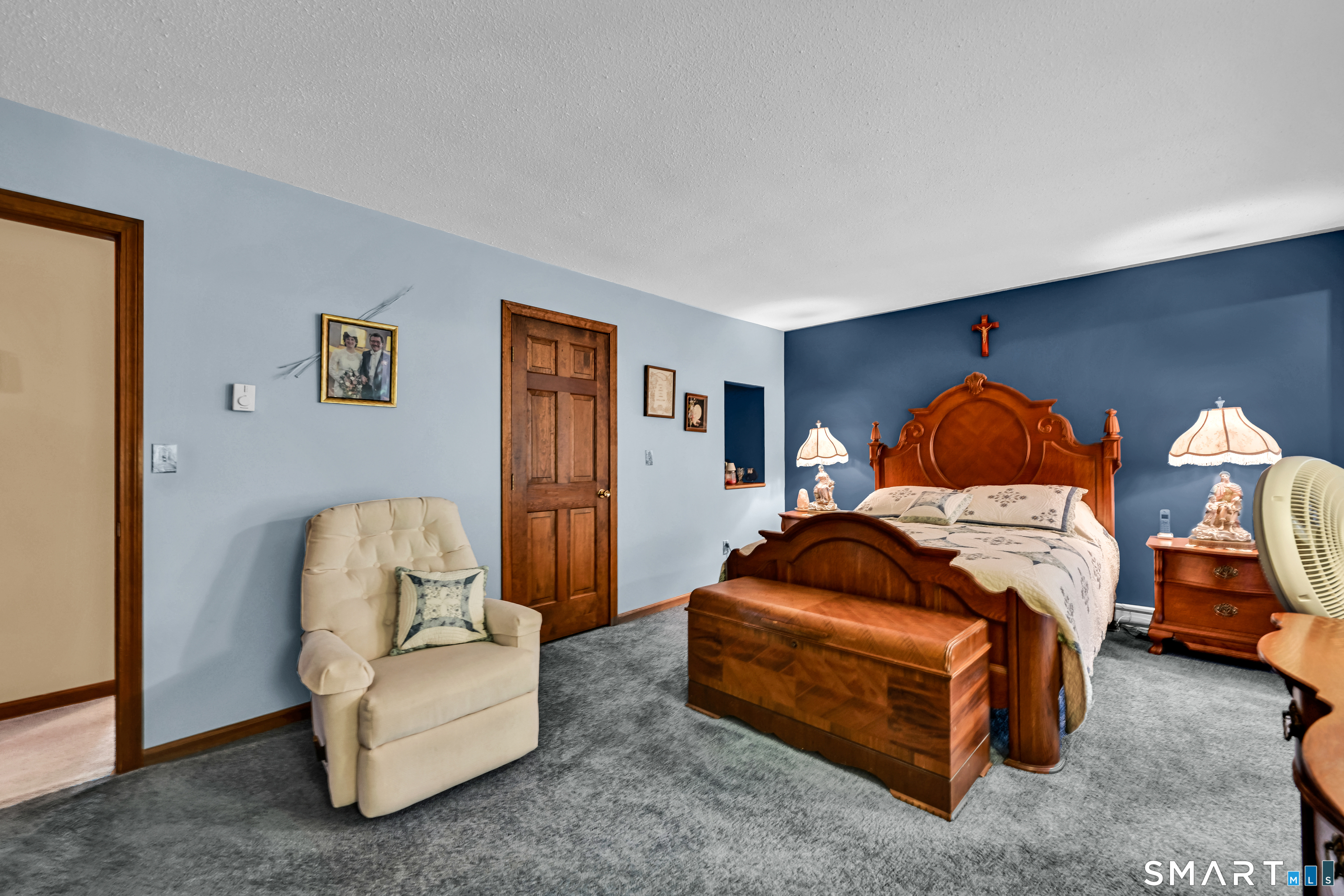 155 Lake Harwinton Road Harwinton, CT 06791 - Photo 22 of 39 a bedroom with furniture and a couch