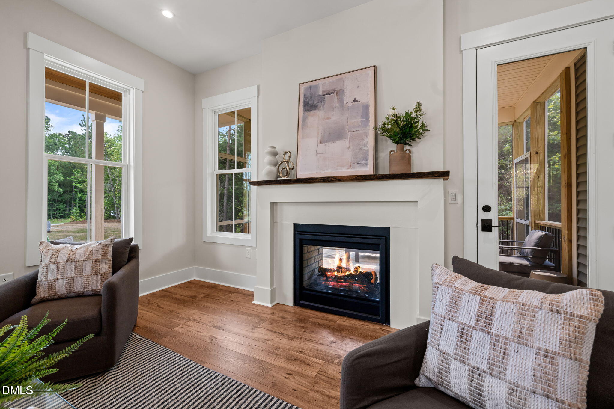 400 Pilot Ridge Road Zebulon, NC 27597 - Photo 10 of 51 a living room with furniture and a fireplace