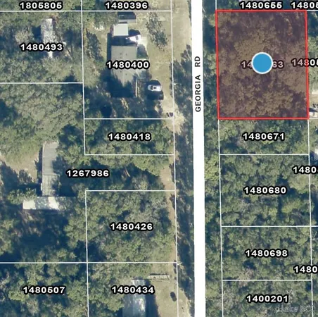 an aerial view of residential house and outdoor space