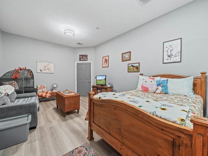 4485 Murphy Road Ona, FL 33865 - Photo 14 of 41 a bedroom that has a bed and a couch