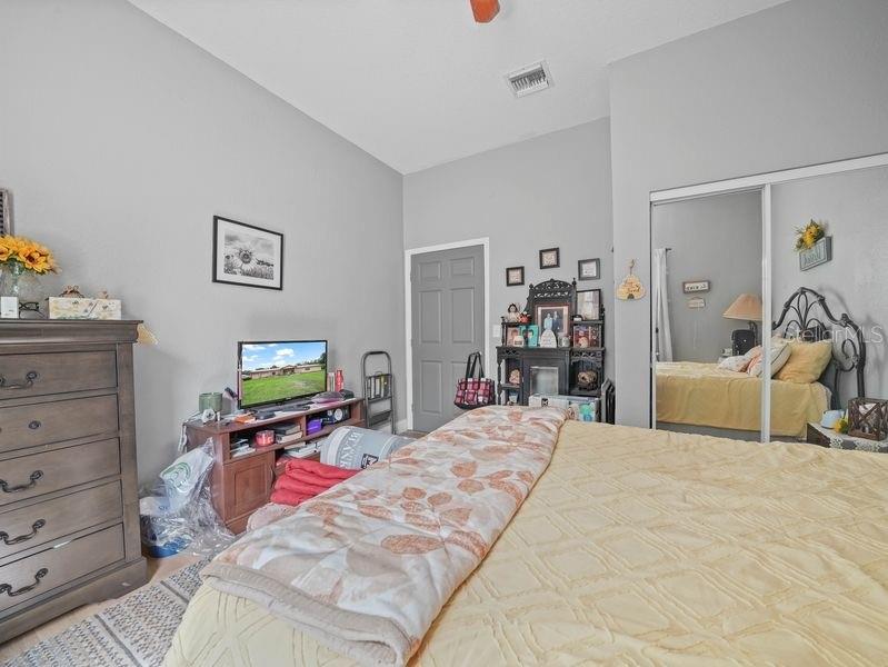 4485 Murphy Road Ona, FL 33865 - Photo 18 of 41 a bed room with a bed and a television