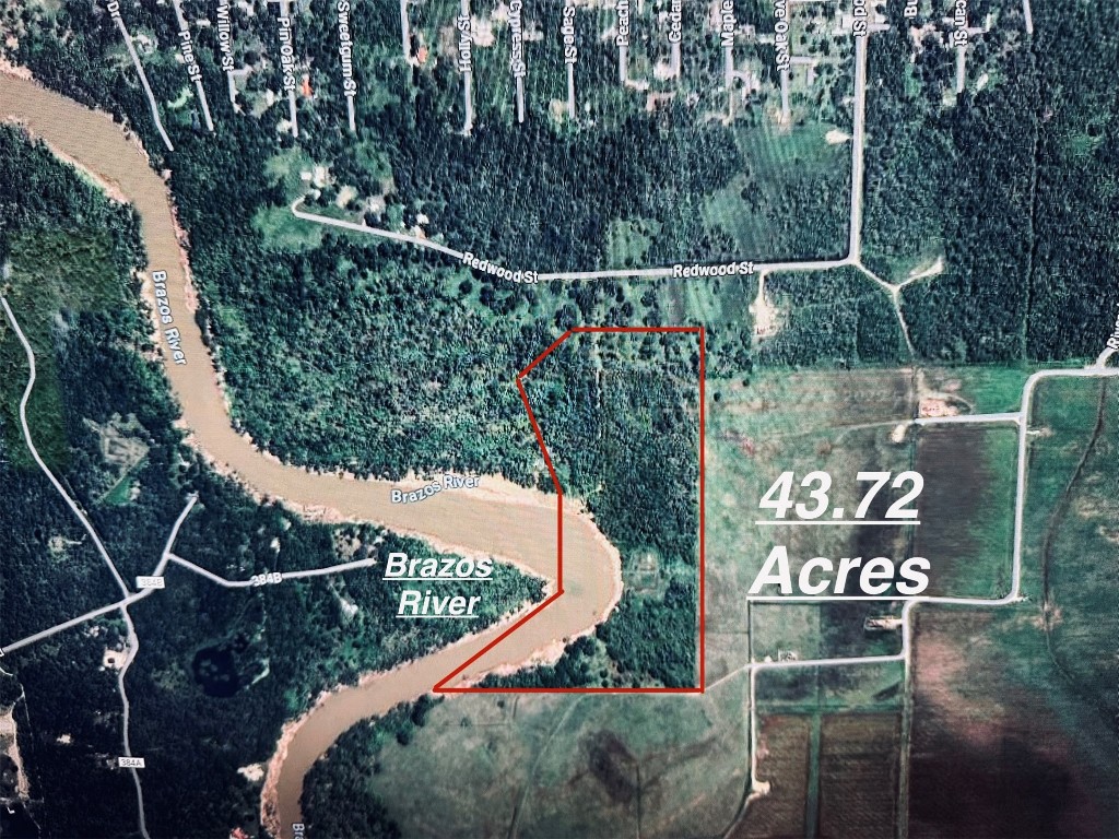 0 Redwood Street Rosharon, TX 77583 - Photo 11 of 11 a view of a street with benches