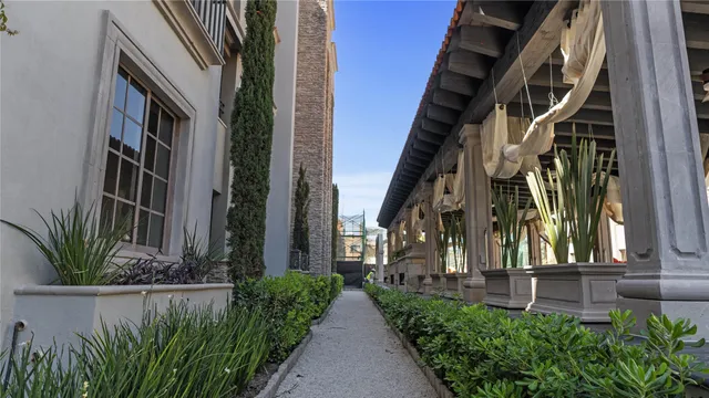 a view of a pathway along the building