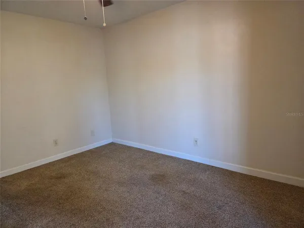 a view of a bathroom from a hallway