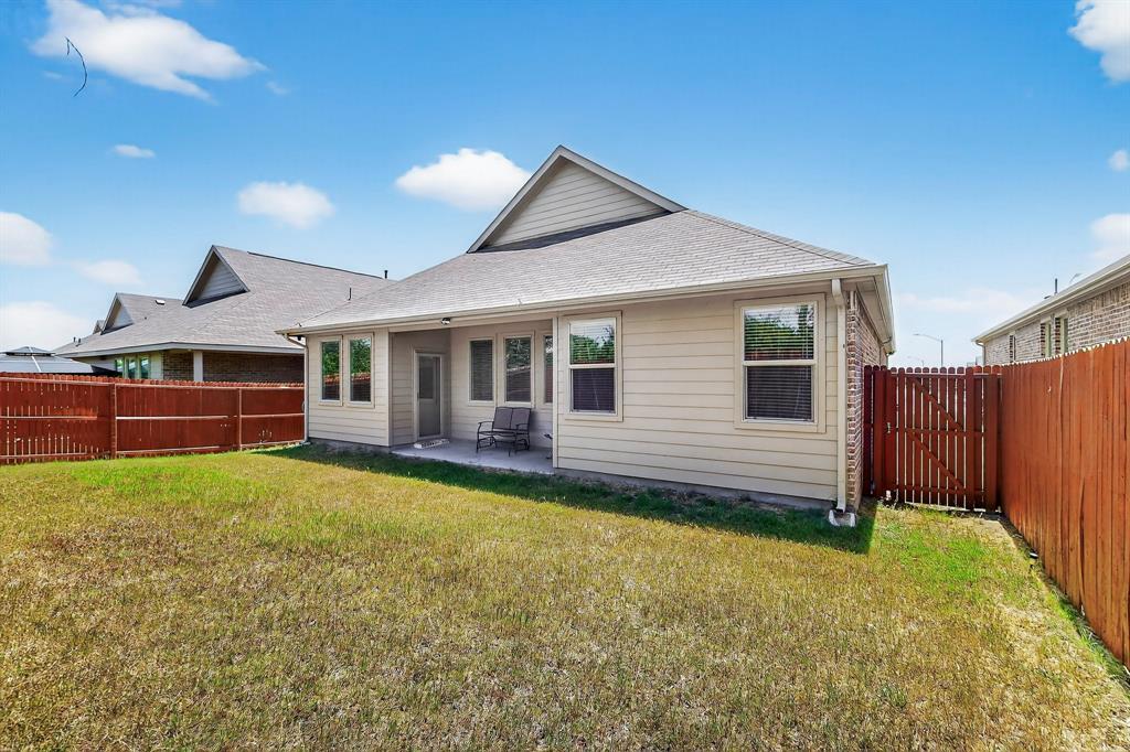 444 Ranchito Pass Fort Worth, TX 76052 - Photo 16 of 24 a view of a house with backyard and porch