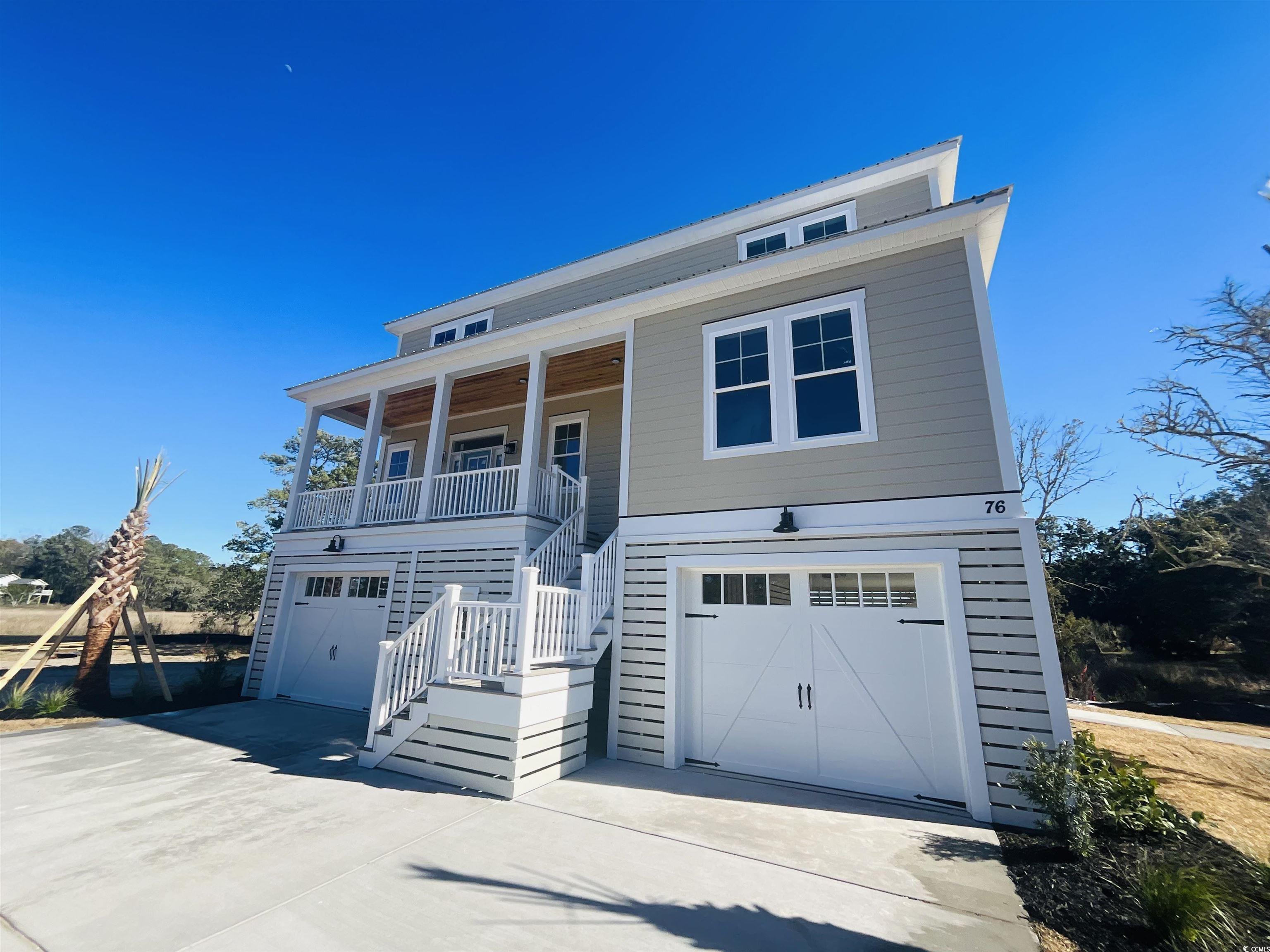 76 Mullet Bay Road Pawleys Island, SC 29585 - Photo 1 of 1 View of front of property featuring covered porch,