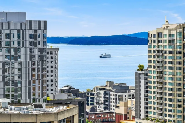 a view of a city with tall buildings