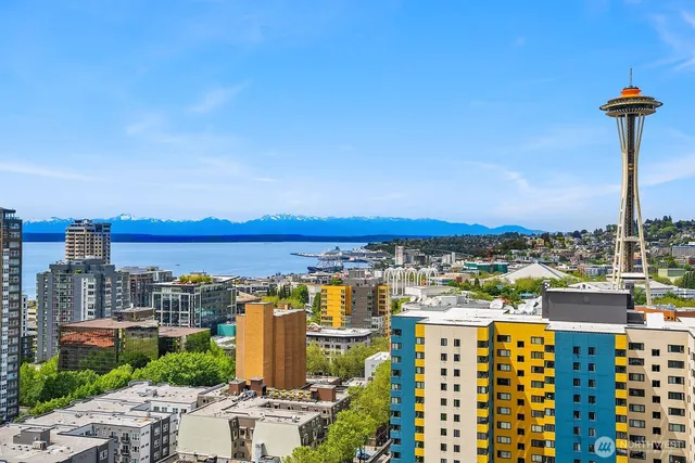 a view of a city with tall buildings