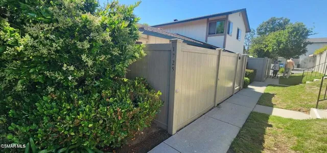 a view of a back yard of the house
