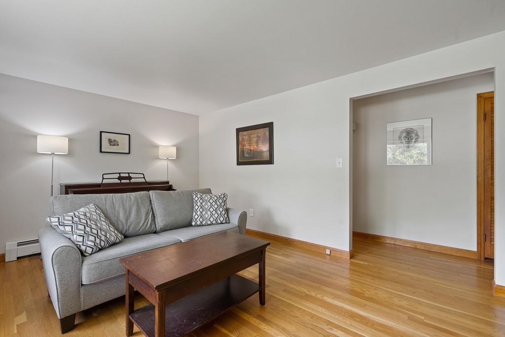 5 Shasta Drive Lancaster, MA 01523 - Photo 6 of 29 a living room with furniture and a wooden floor