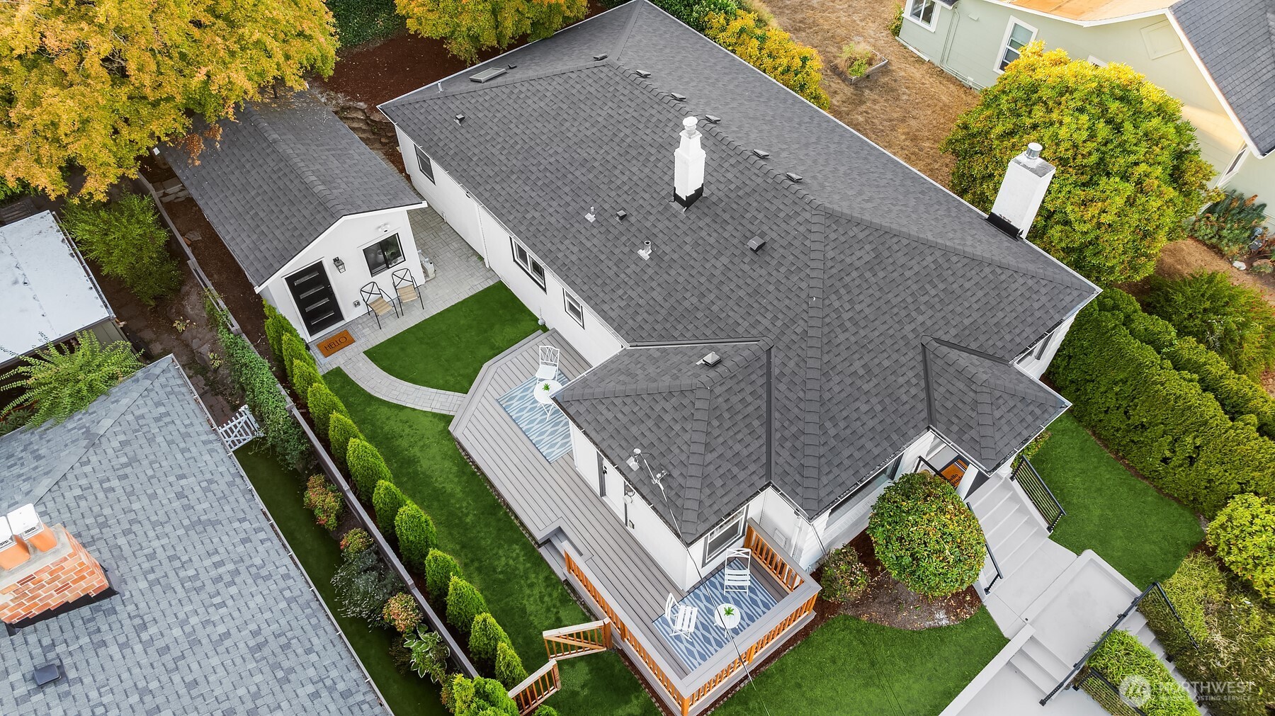 3257 37th Avenue Southwest Seattle, WA 98126 - Photo 34 of 40 an aerial view of a house with backyard space and balcony