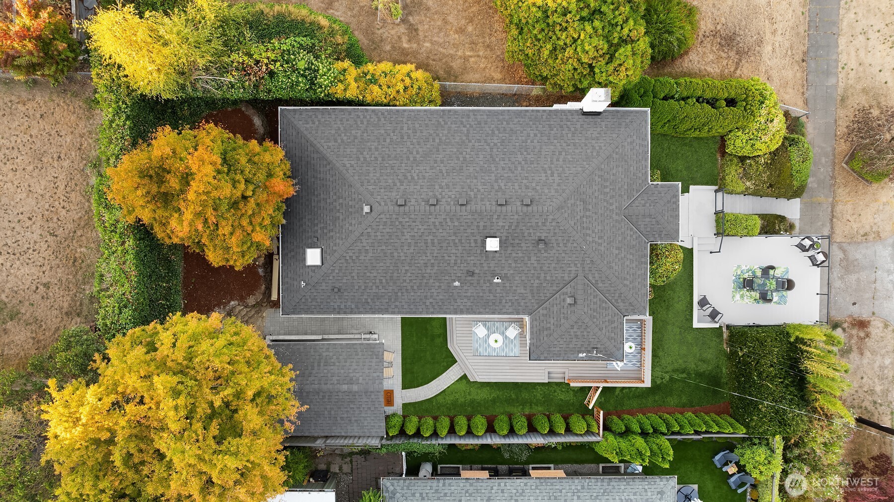 3257 37th Avenue Southwest Seattle, WA 98126 - Photo 35 of 40 an aerial view of a house with a swimming pool and outdoor space
