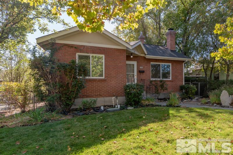 608 Cheney Street Reno, NV 89502 - Photo 1 of 22 a front view of a house with garden