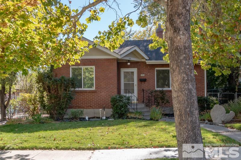 608 Cheney Street Reno, NV 89502 - Photo 2 of 22 a front view of a house with garden