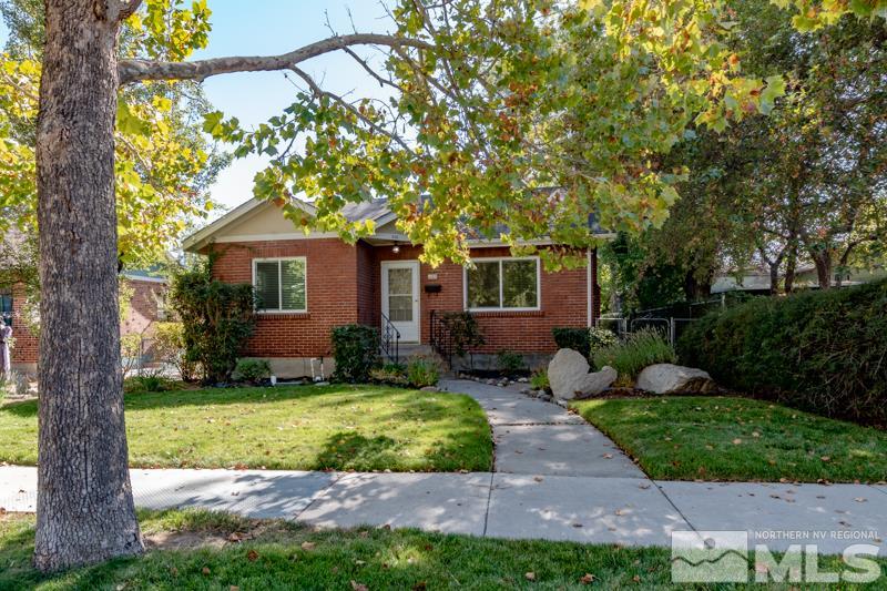 608 Cheney Street Reno, NV 89502 - Photo 3 of 22 a front view of a house with garden