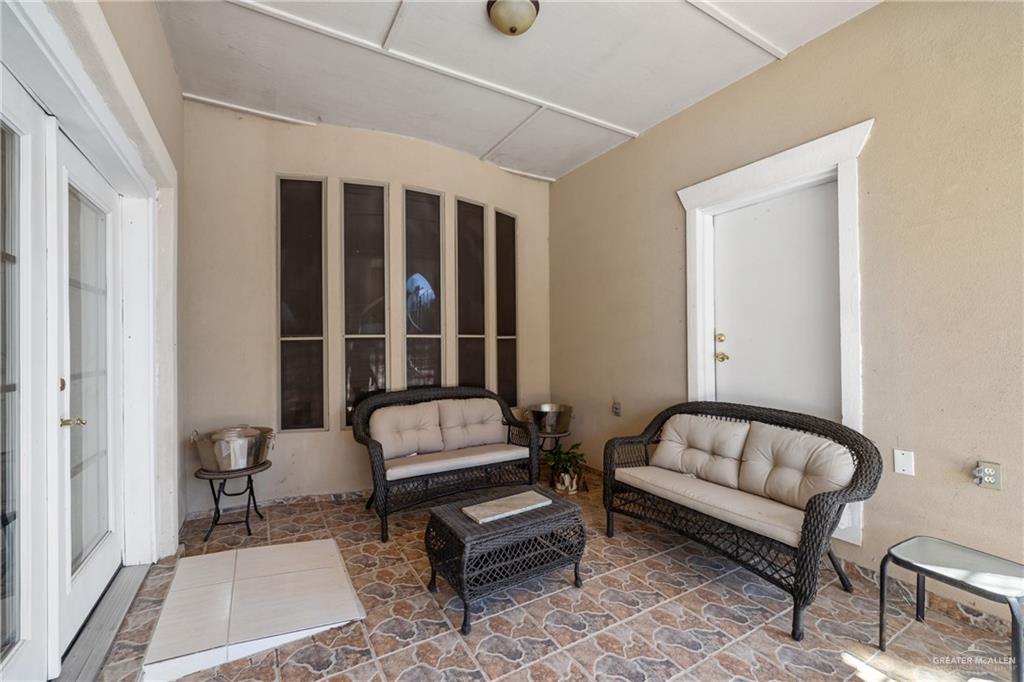 8413 North Main Street McAllen, TX 78504 - Photo 23 of 37 a living room with furniture and a window