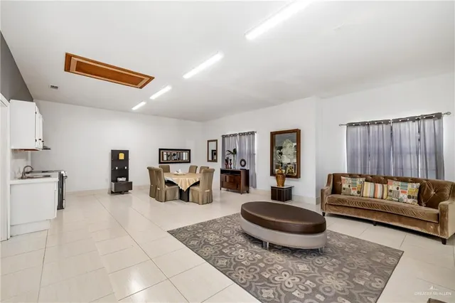 a living room with furniture and a couch