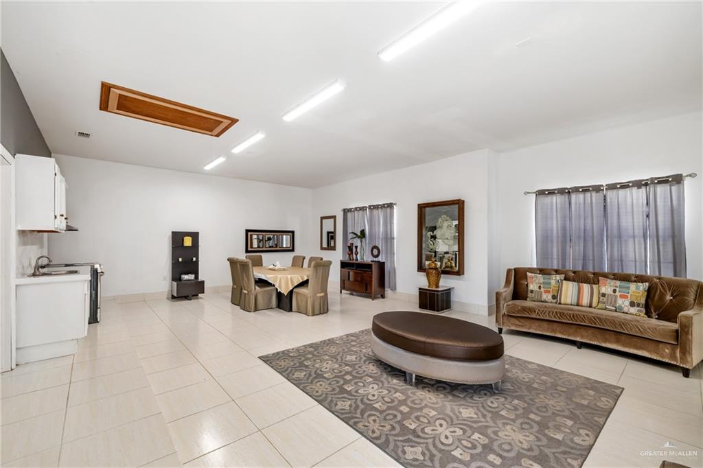 8413 North Main Street McAllen, TX 78504 - Photo 24 of 37 a living room with furniture and a couch
