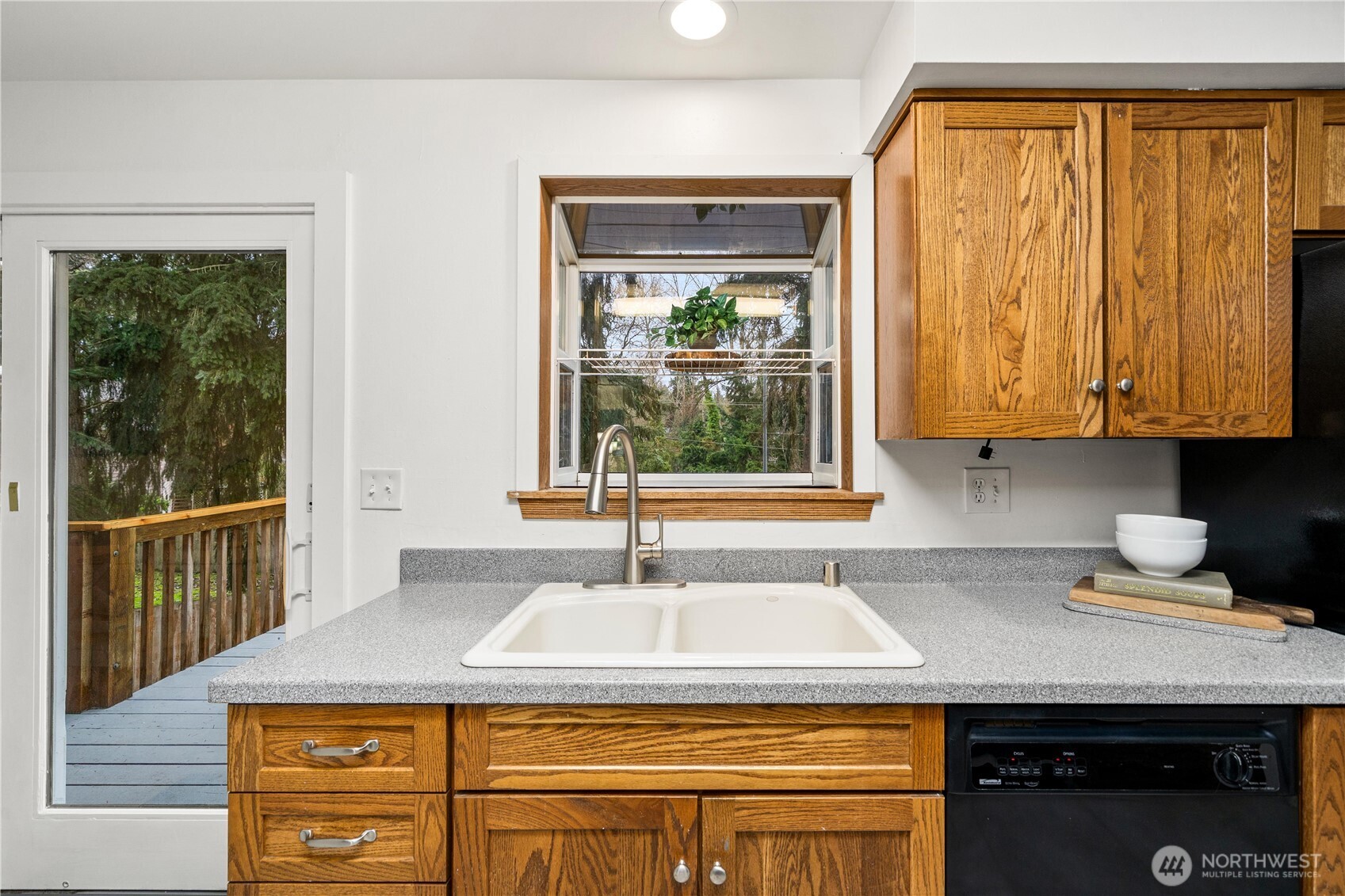 114 Southwest 313th Street Federal Way, WA 98023 - Photo 13 of 40 a kitchen with a stove top oven