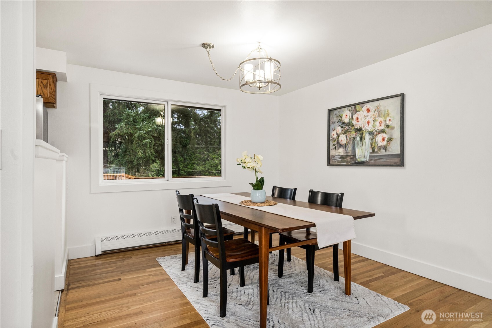114 Southwest 313th Street Federal Way, WA 98023 - Photo 15 of 40 a view of a dining room with furniture window and wooden floor