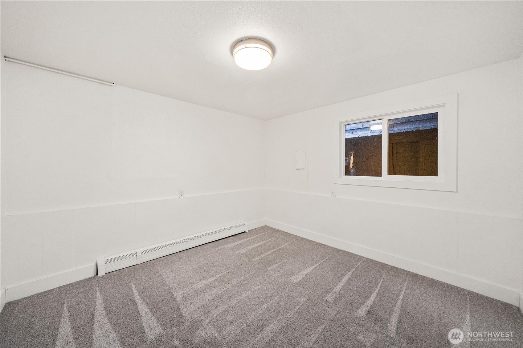 114 Southwest 313th Street Federal Way, WA 98023 - Photo 20 of 40 a view of an empty room with a window