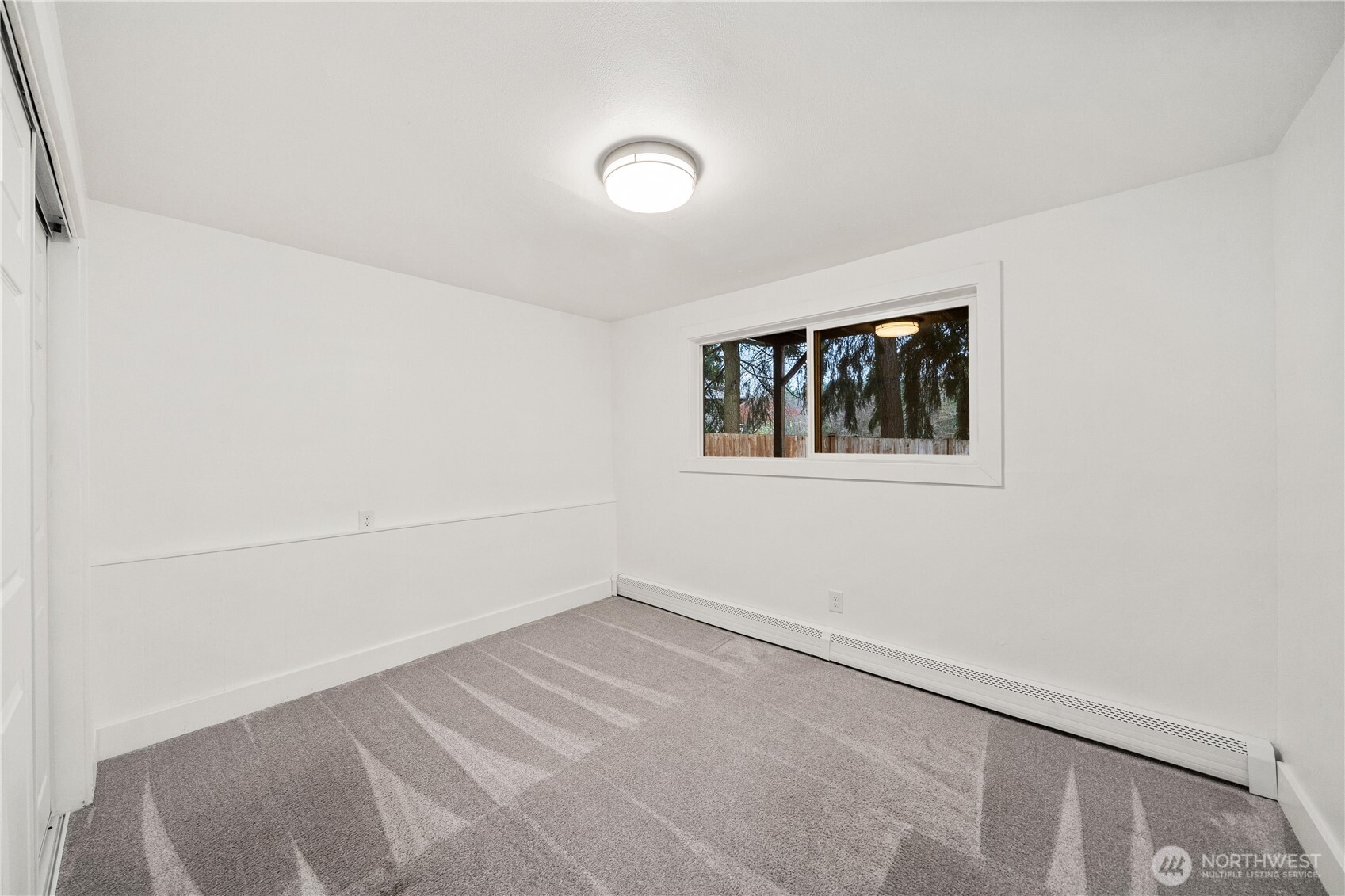 114 Southwest 313th Street Federal Way, WA 98023 - Photo 21 of 40 an empty room with a window