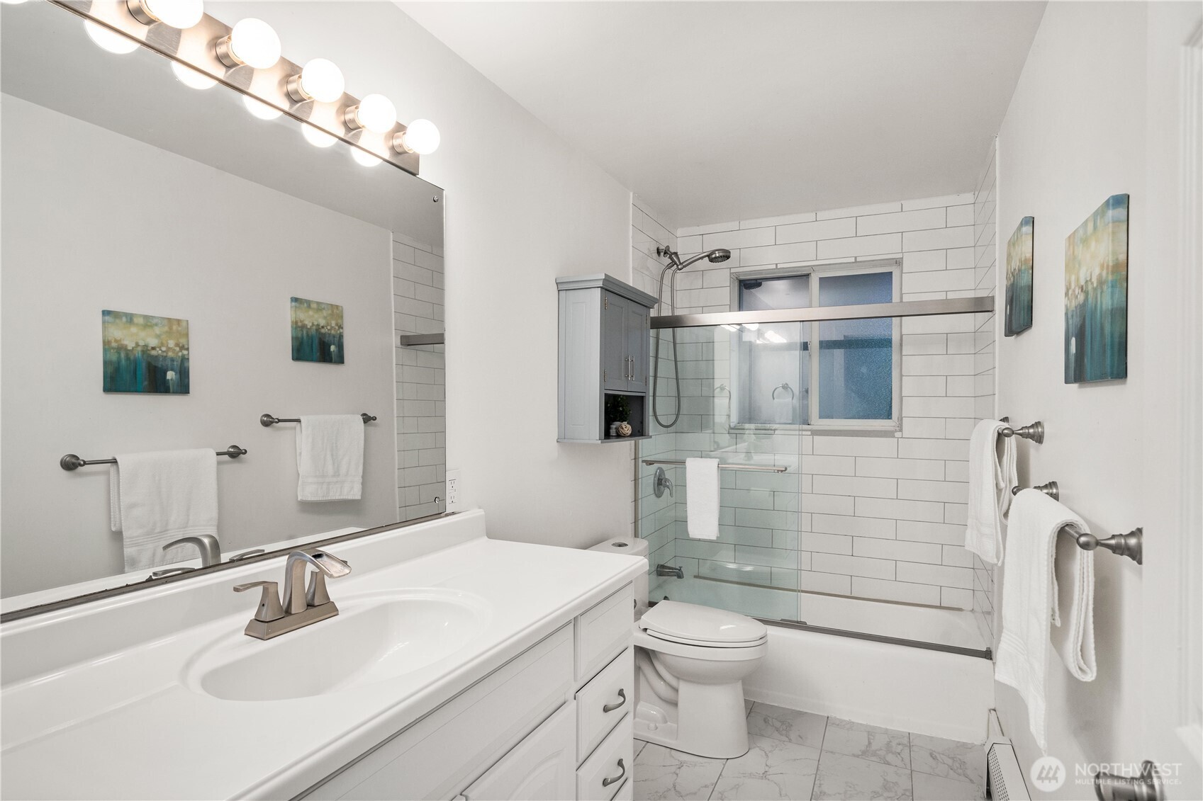 114 Southwest 313th Street Federal Way, WA 98023 - Photo 28 of 40 a bathroom with a sink a toilet and shower