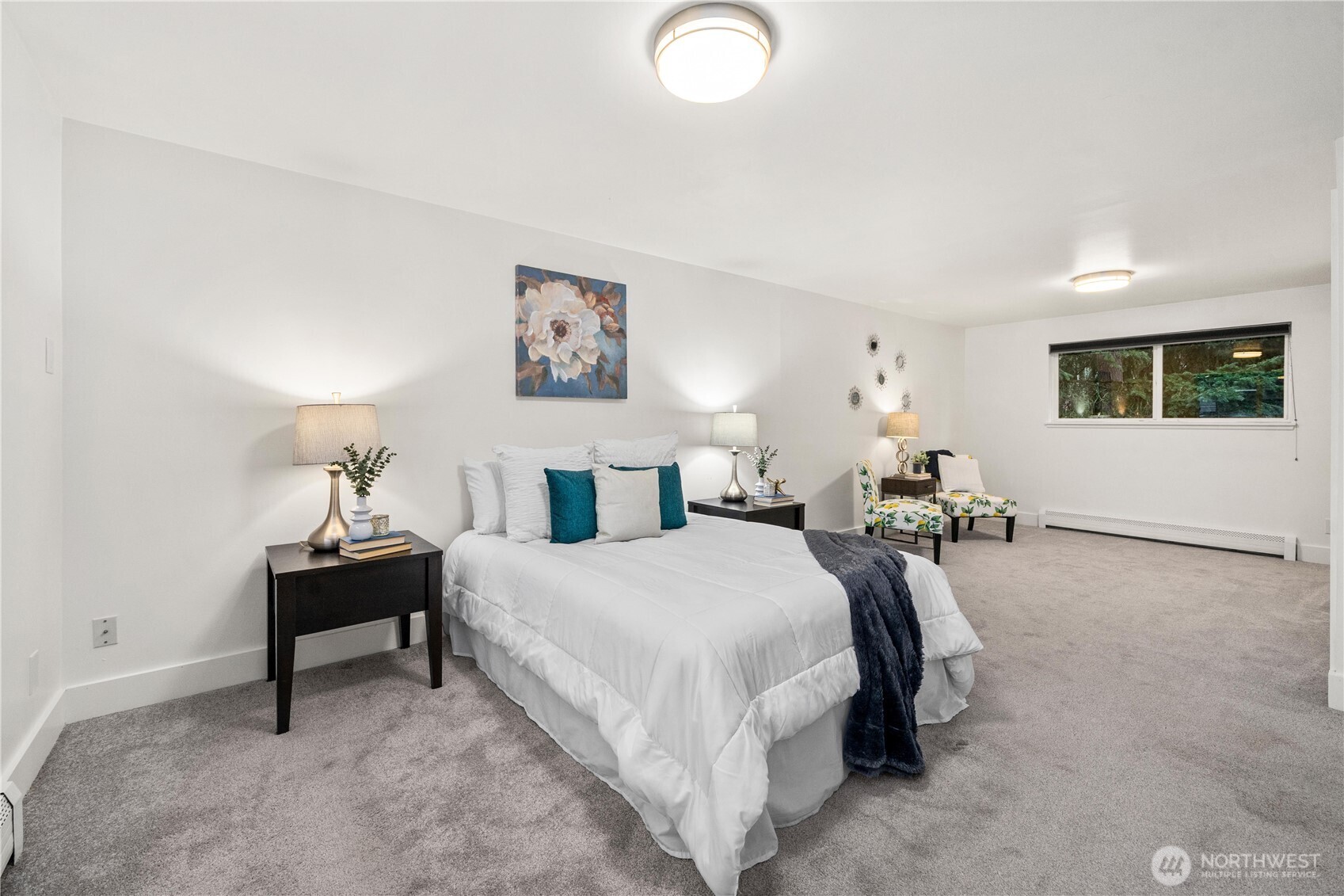 114 Southwest 313th Street Federal Way, WA 98023 - Photo 30 of 40 a bedroom with a bed and a chandelier