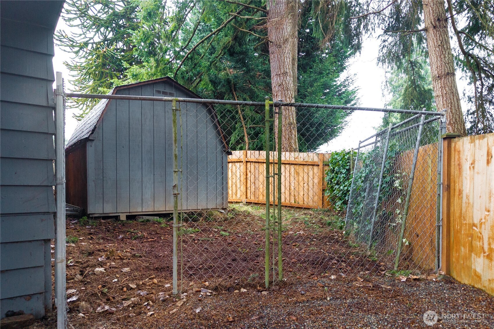 114 Southwest 313th Street Federal Way, WA 98023 - Photo 35 of 40 a backyard of a house with lots of green space