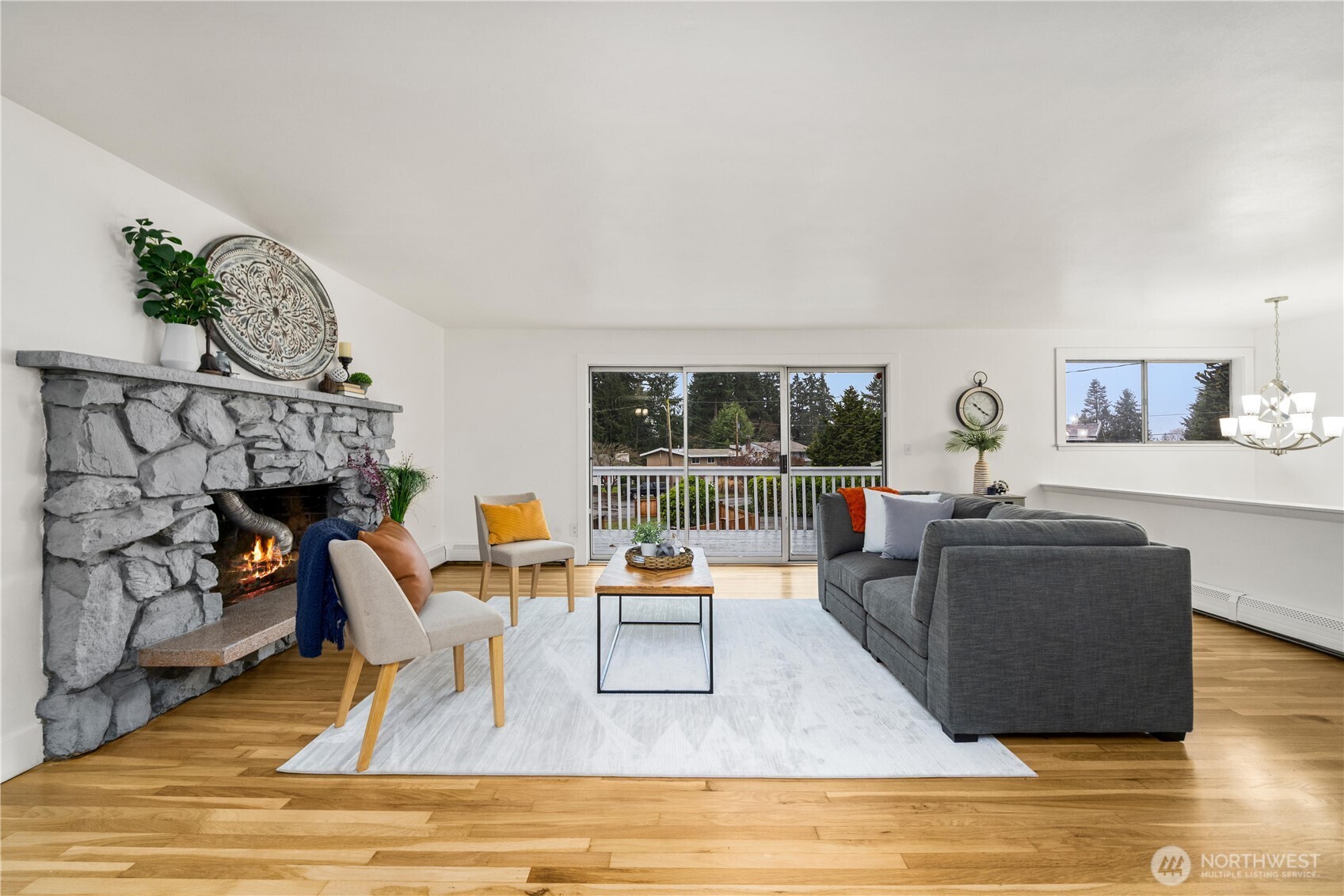 114 Southwest 313th Street Federal Way, WA 98023 - Photo 6 of 40 a living room with furniture and a fireplace