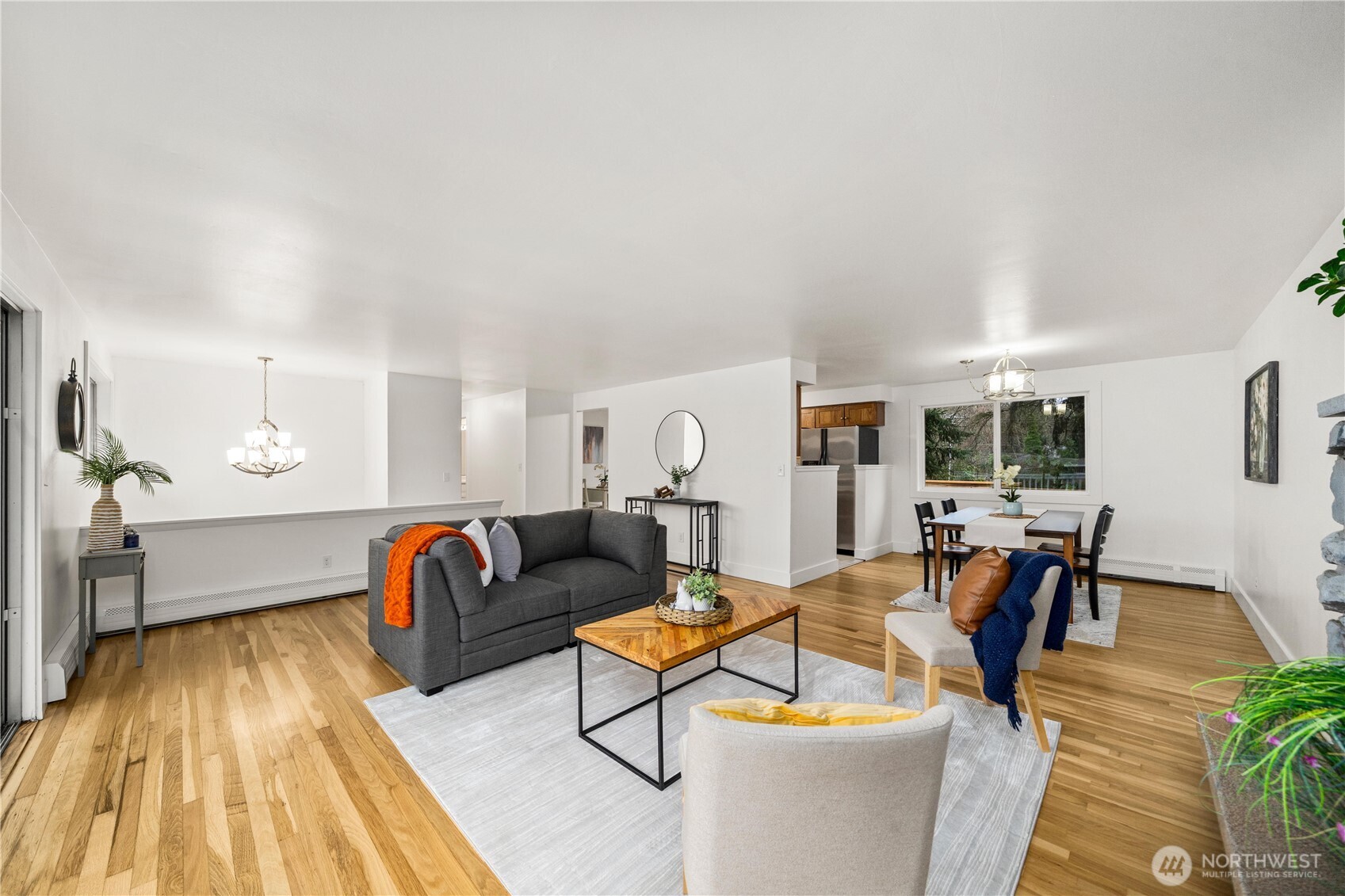 114 Southwest 313th Street Federal Way, WA 98023 - Photo 9 of 40 a living room with furniture and wooden floor