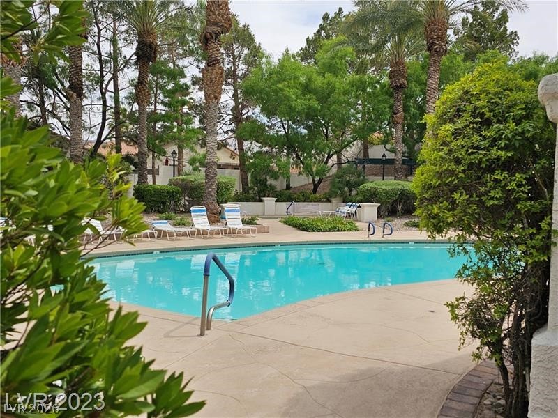 285 Spring Palms Street Henderson, NV 89012 - Photo 35 of 38 Pool featuring a patio area