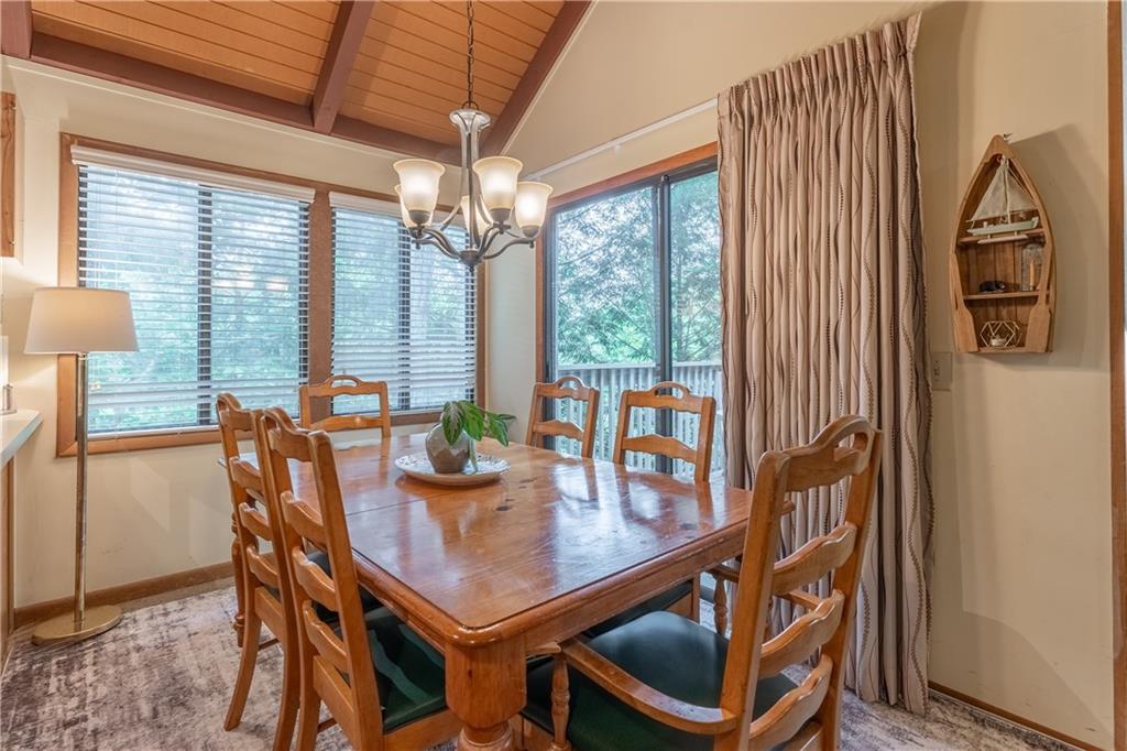 135 Wolfscratch Drive Jasper, GA 30143 - Photo 3 of 18 a view of a dining room with furniture window and outside view