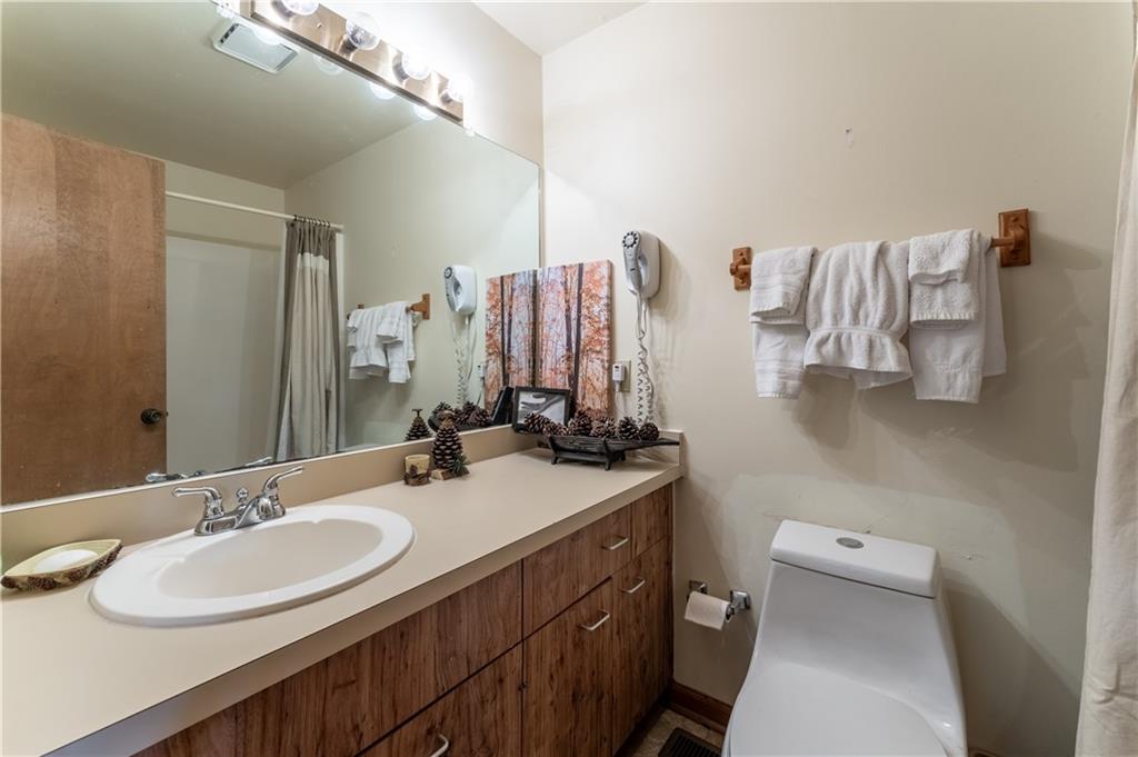135 Wolfscratch Drive Jasper, GA 30143 - Photo 10 of 18 a bathroom with a sink double vanity and a mirror