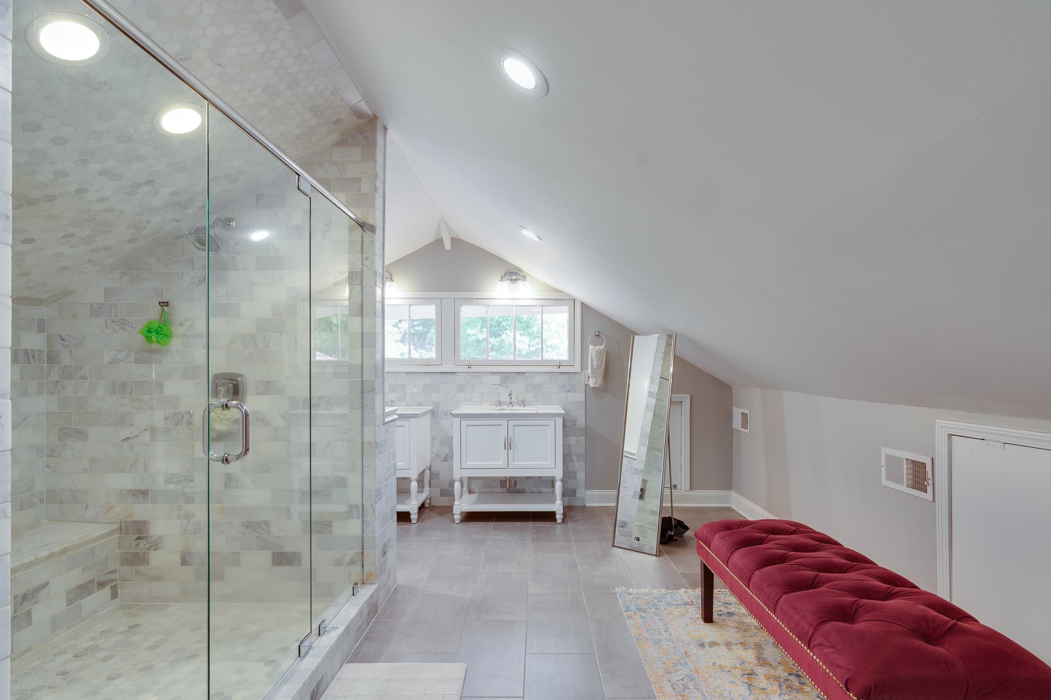 279 Angelus Street Memphis, TN 38112 - Photo 19 of 34 a spacious bedroom with a bed and a window