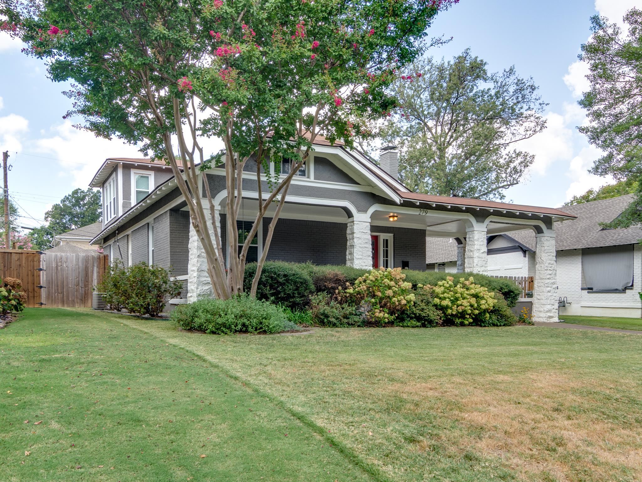 279 Angelus Street Memphis, TN 38112 - Photo 3 of 34 a front view of a house with garden