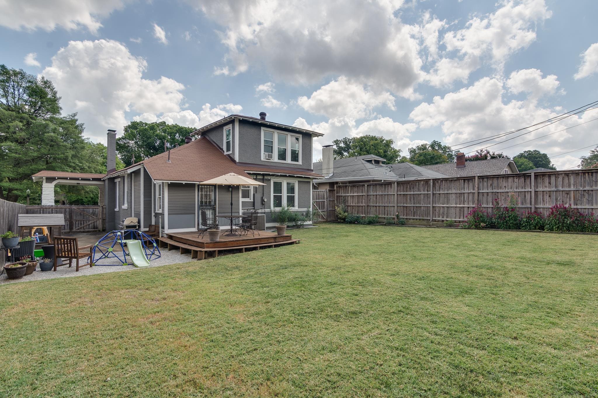 279 Angelus Street Memphis, TN 38112 - Photo 31 of 34 a view of a house with a yard porch and sitting area