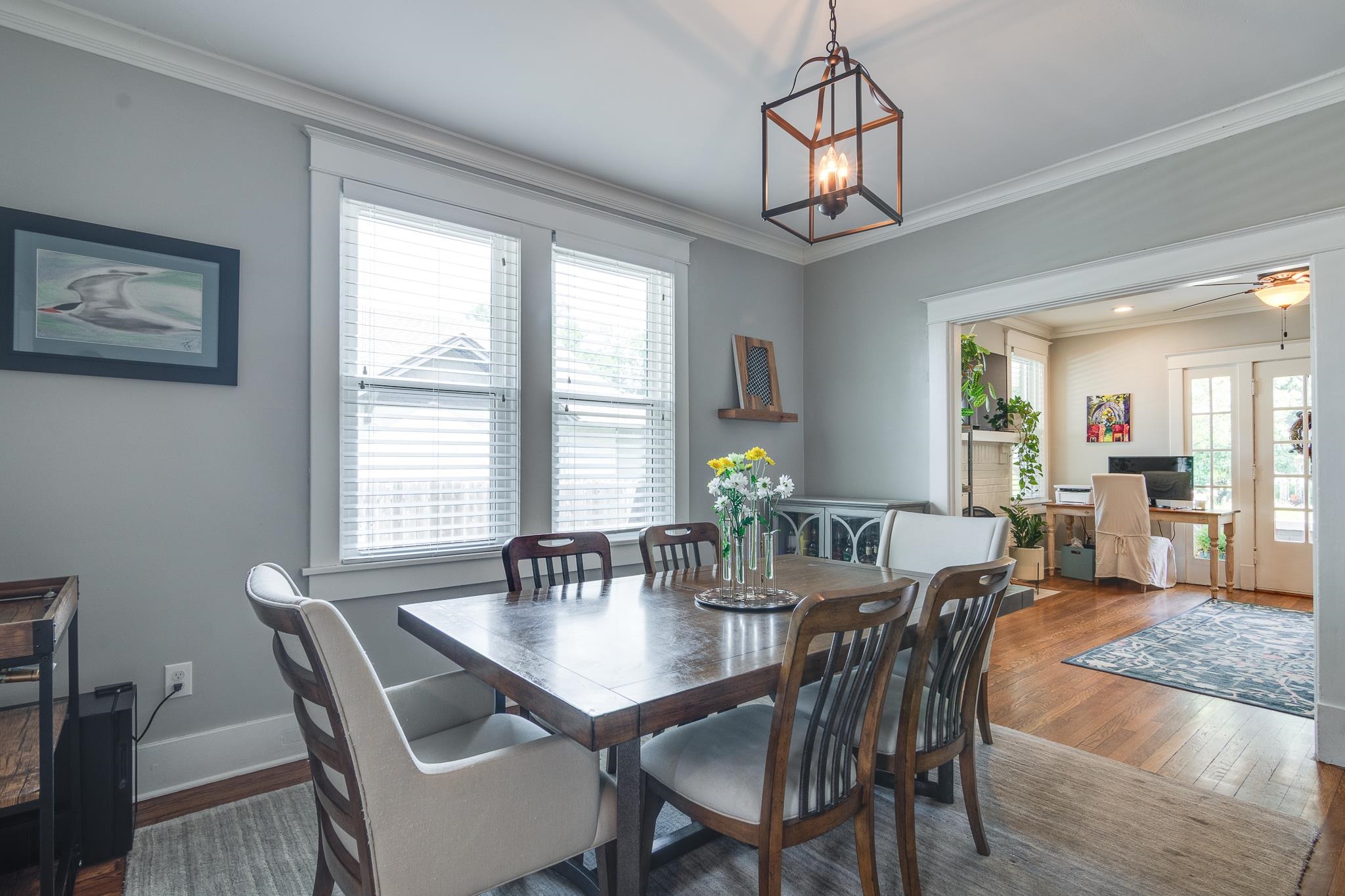 279 Angelus Street Memphis, TN 38112 - Photo 10 of 34 a view of a dining room with furniture window and wooden floor