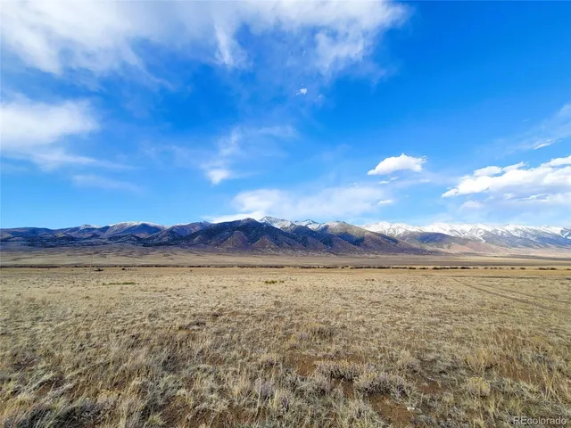 a view of mountain with lake view