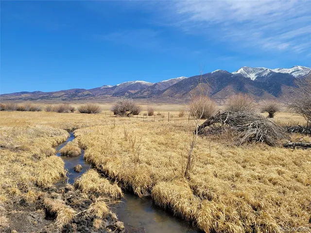 a view of lake and mountain