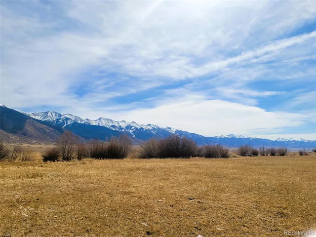 a view of lake and mountain
