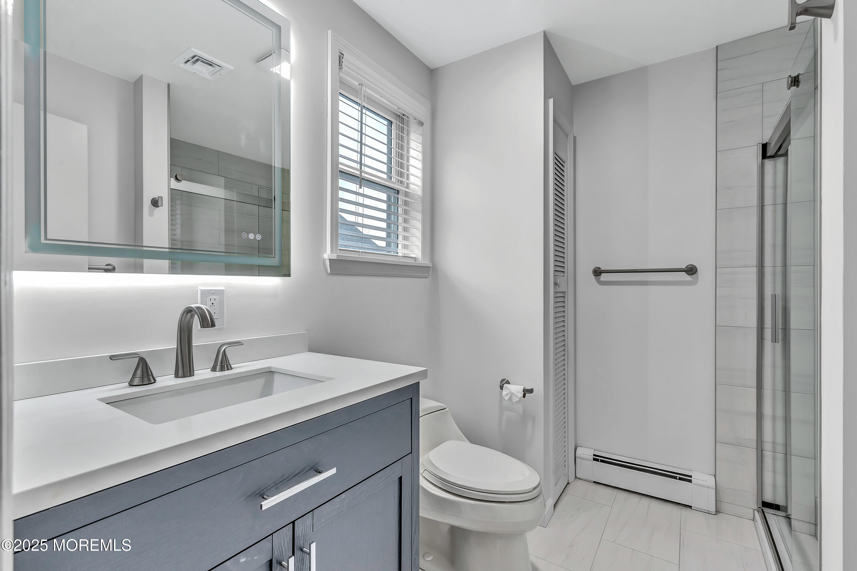 370 East Main Street Manasquan, NJ 08736 - Photo 19 of 34 a bathroom with a sink toilet and shower