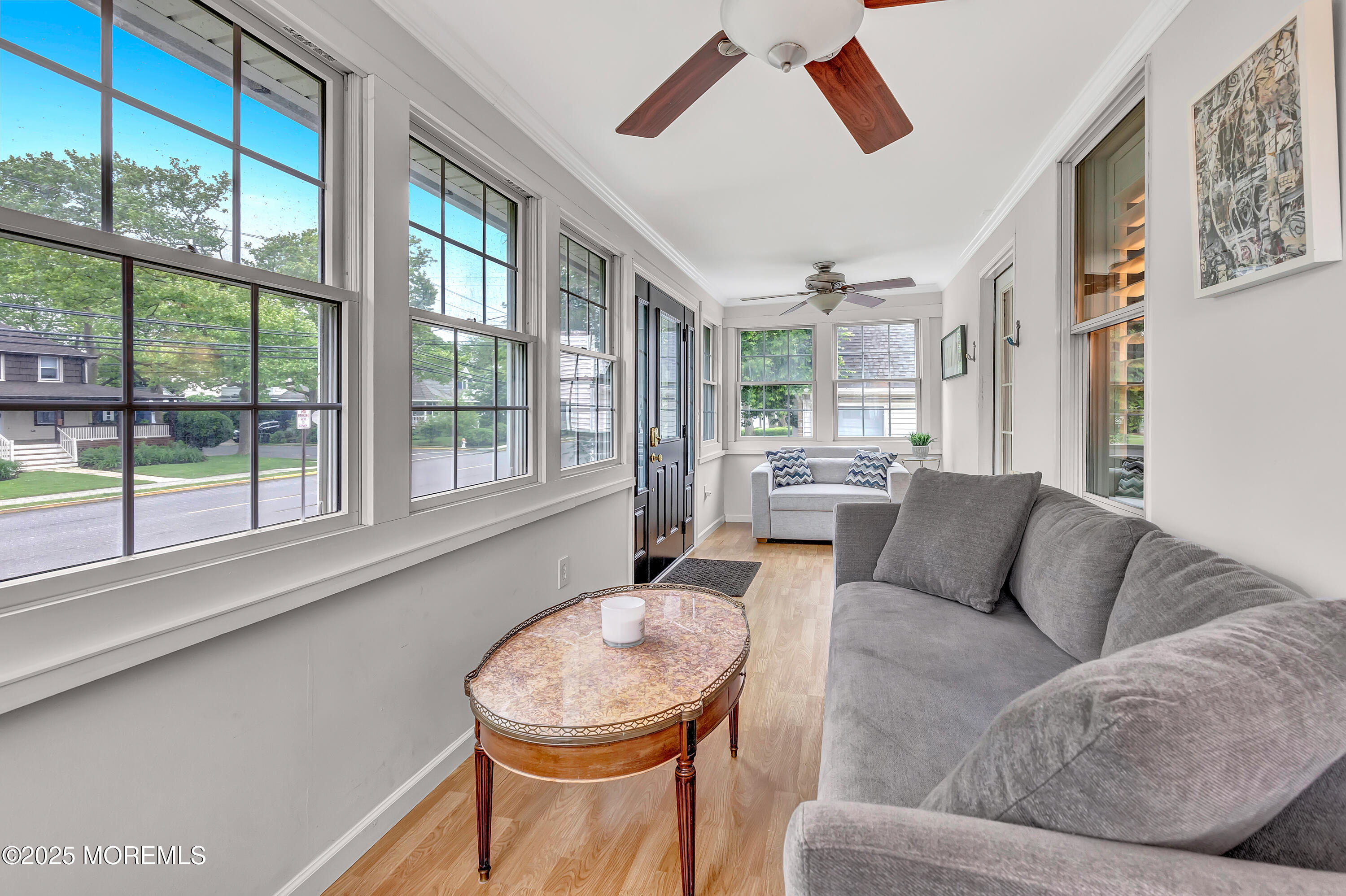 370 East Main Street Manasquan, NJ 08736 - Photo 20 of 34 a living room with furniture and a large window