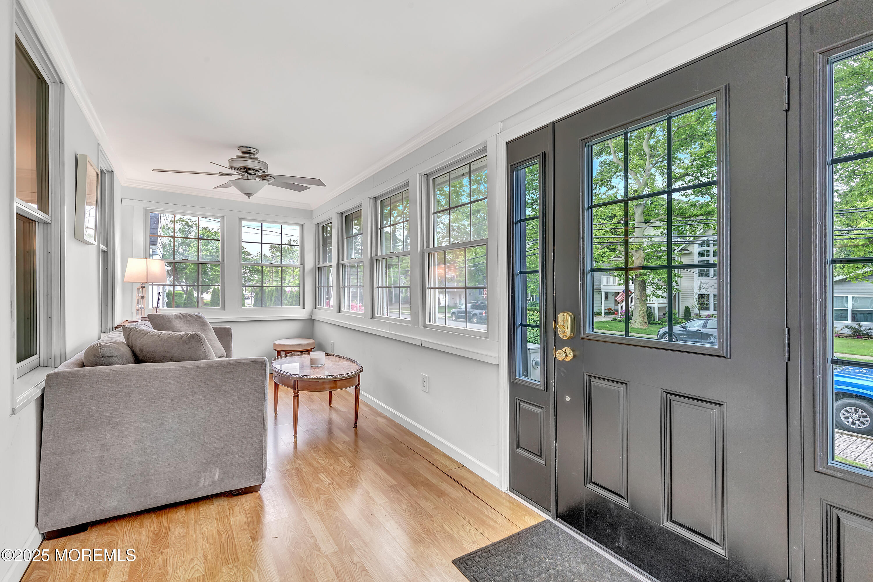370 East Main Street Manasquan, NJ 08736 - Photo 4 of 34 a living room with furniture and a large window