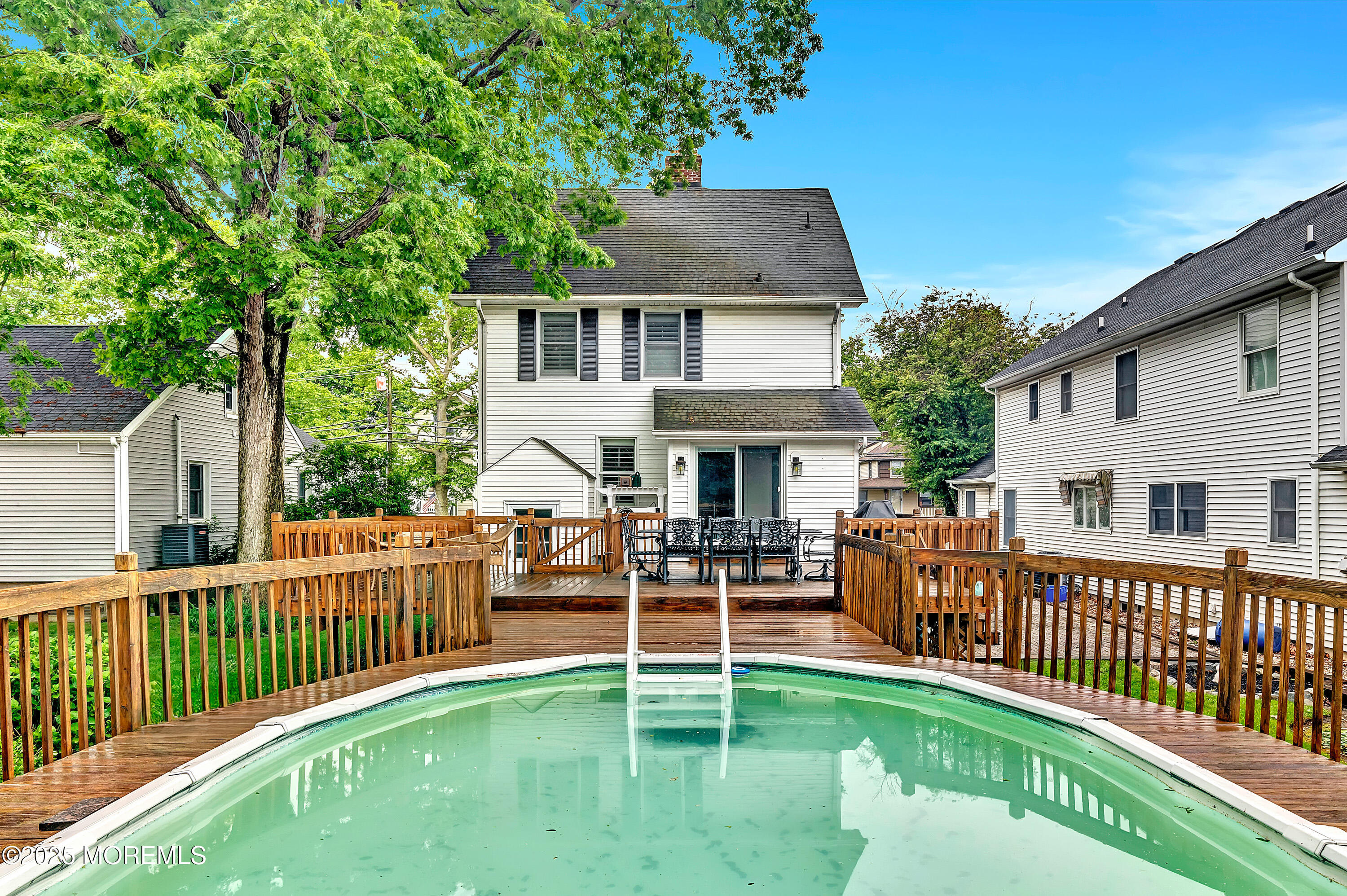 370 East Main Street Manasquan, NJ 08736 - Photo 8 of 34 a house view with a deck and a yard