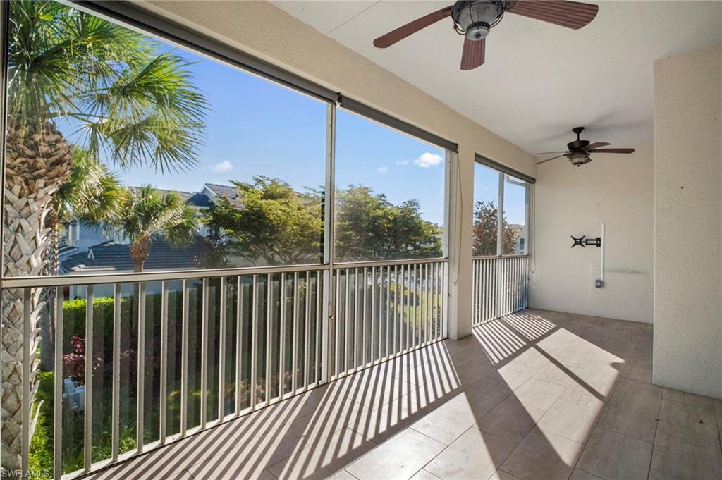 6934 Avalon Circle, Unit 405 Naples, FL 34112 - Photo 7 of 16 View of unfurnished sunroom