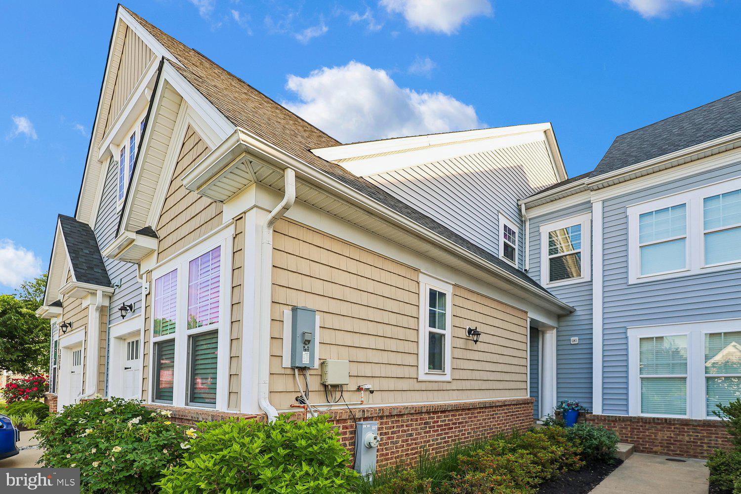 3068 Spring Peeper Court Odenton, MD 21113 - Photo 5 of 29 a front view of a house with a yard
